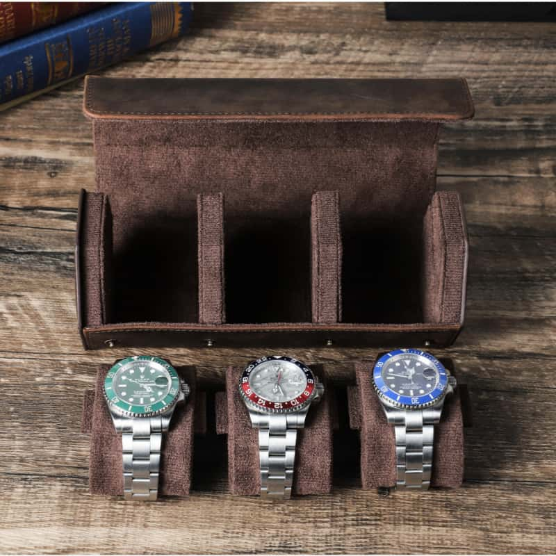 VCD-E premium handcrafted retro fashion flip-top 3-slot cowhide leather watch travel case removable pillow slides are designed to securely hold your watches in place while offering flexibility in storage, allowing you to arrange your collection just the way you like it.