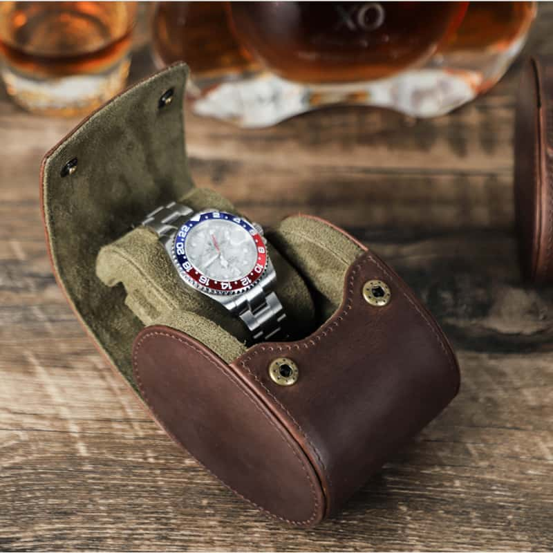 VCD-E premium handcrafted retro fashion hidden snap buttons 1-slot cowhide leather travel watch roll interior scratch resistant fabric to shield watch glass from scratches and keep it looking as good as new.