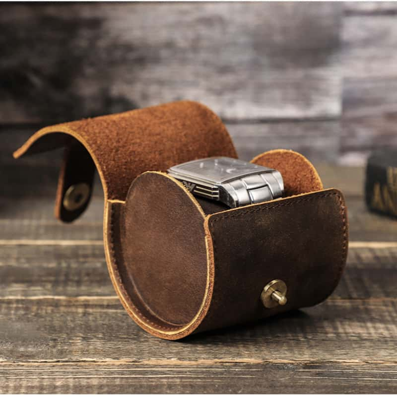 VCD-E premium handcrafted retro fashion oval shape 1-slot cowhide leather travel watch roll scratch resistant fabric protect watch glass from damage.