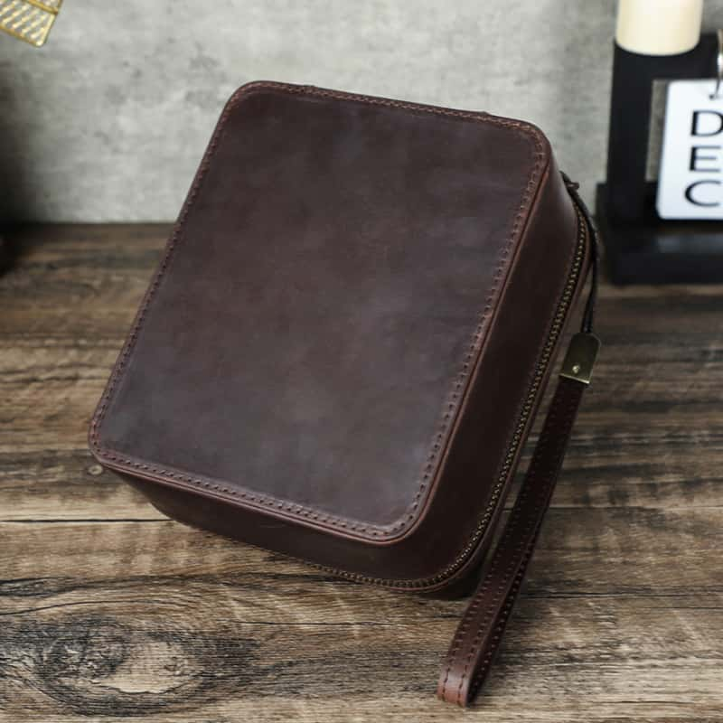 VCD-E premium handcrafted retro fashion teeth zipper cowhide leather 1-slot watch travel case is portable with removable leather wrist strap.